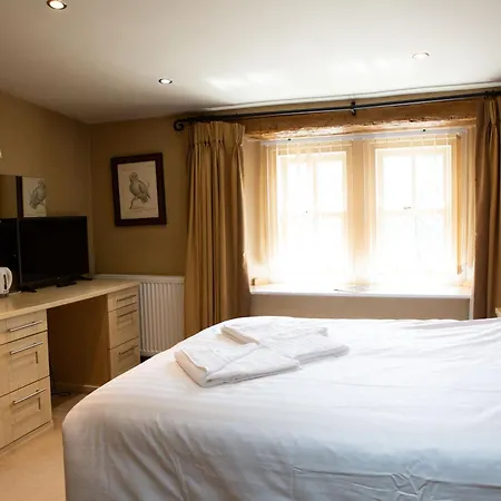 אורחן Coach House